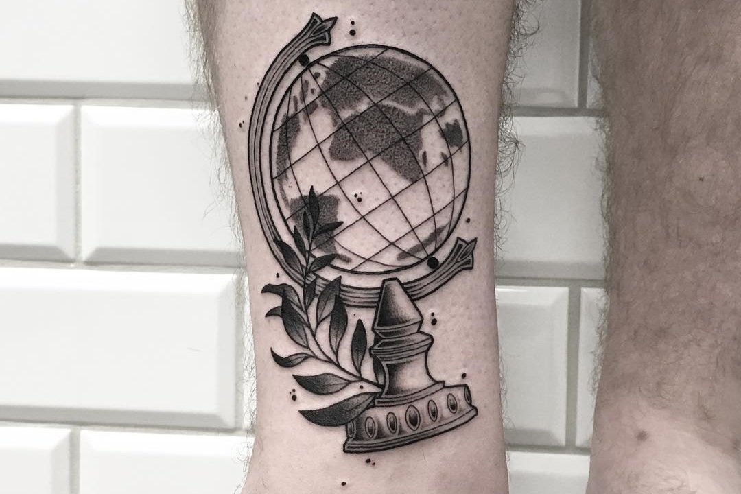 Globe-tattoo-on-the-ankle