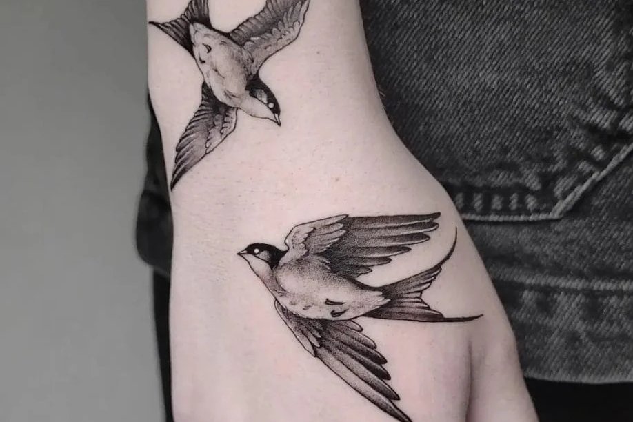 Swallow-Tattoo-on-Hand-918x1024