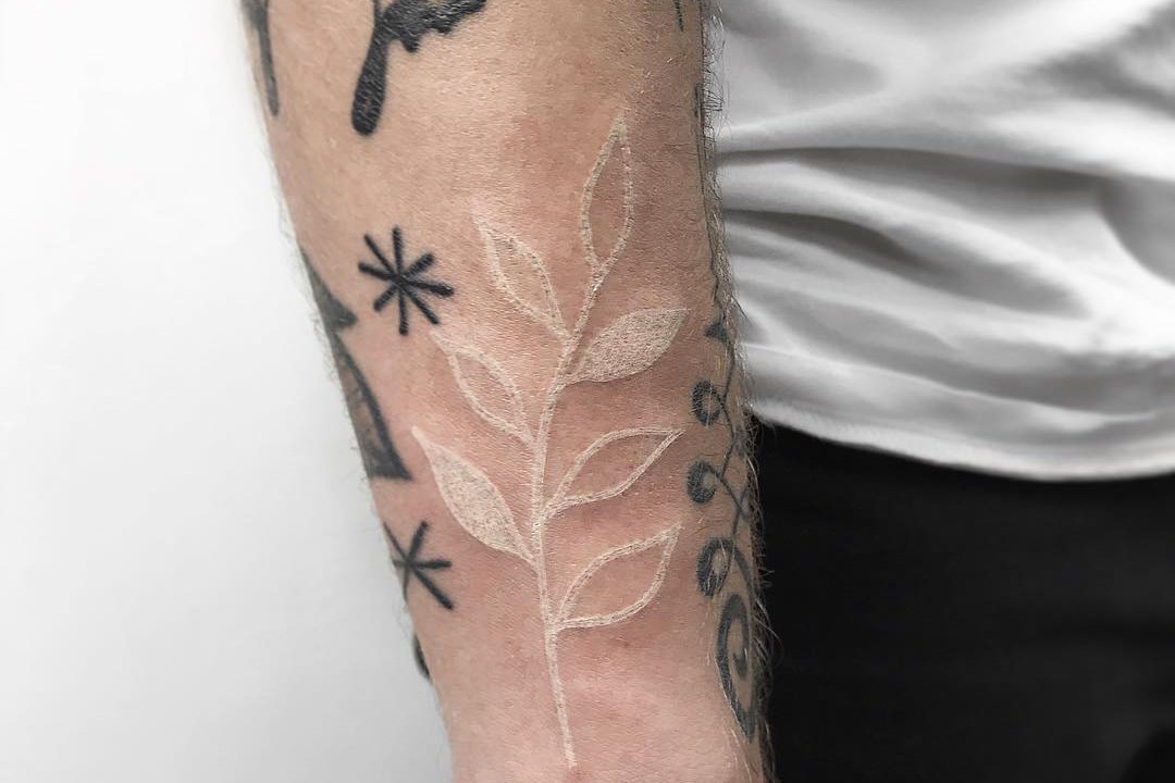 White-leaf-tattoo-by-Łukasz-Krupiński.jpg