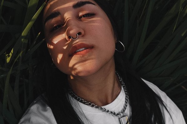 Woman-with-septum-and-ear-piercing