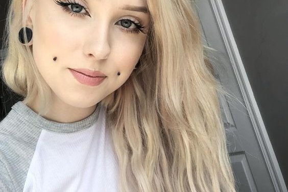 a-double-cheek-piercing-and-tunnel-piercings-for-sprucing-up-the-look-and-making-it-bolder